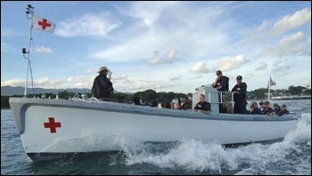 This is a standard Navy utility boat that was refurbished in 2006 by civil service mariner crew members for emergency medical aid in San Diego. Photo by MCC Edward Martens.