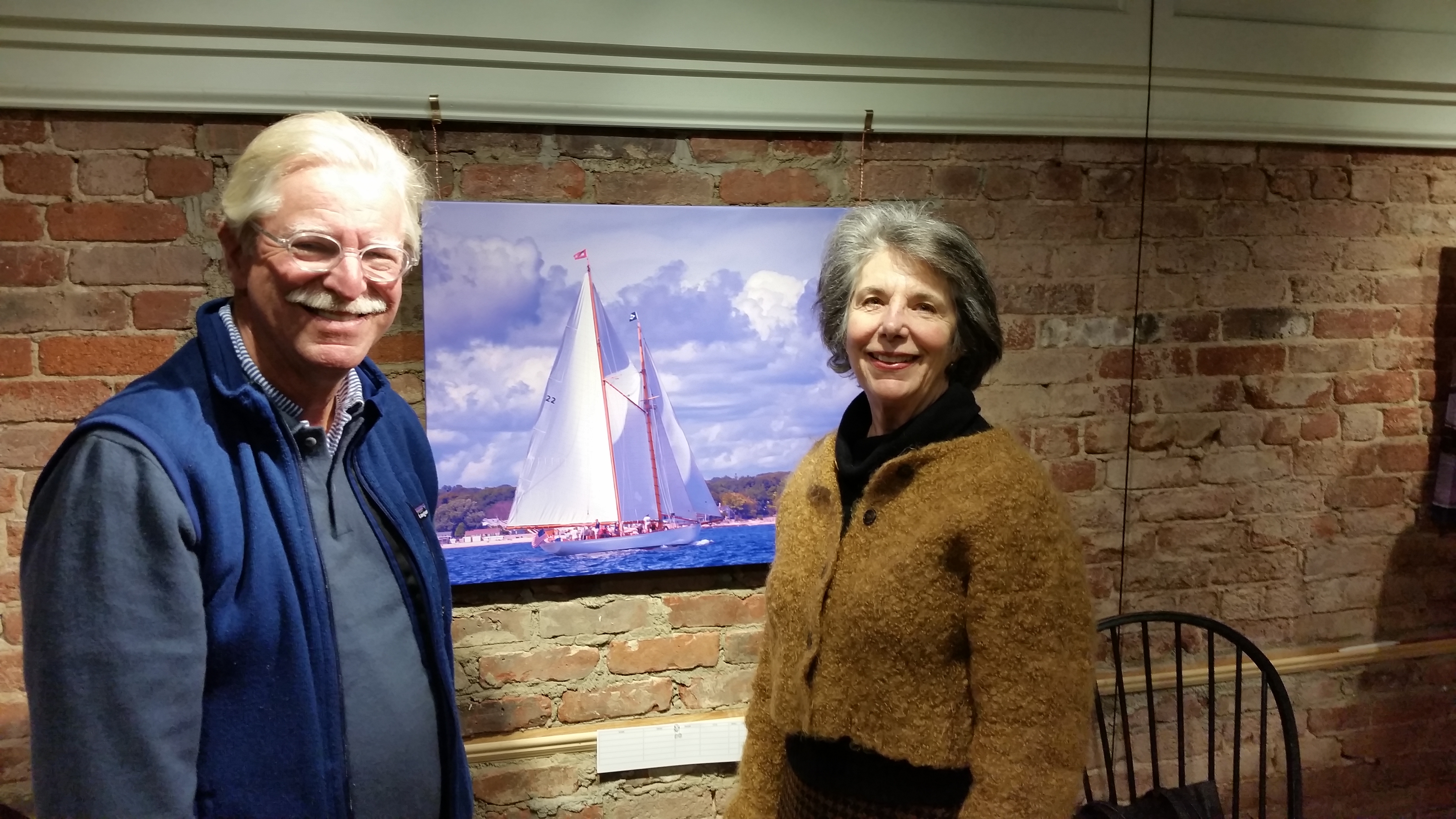 Chris Cox and Penny Parsekian caught admiring one of Joe Geraci's photos of the Brilliant